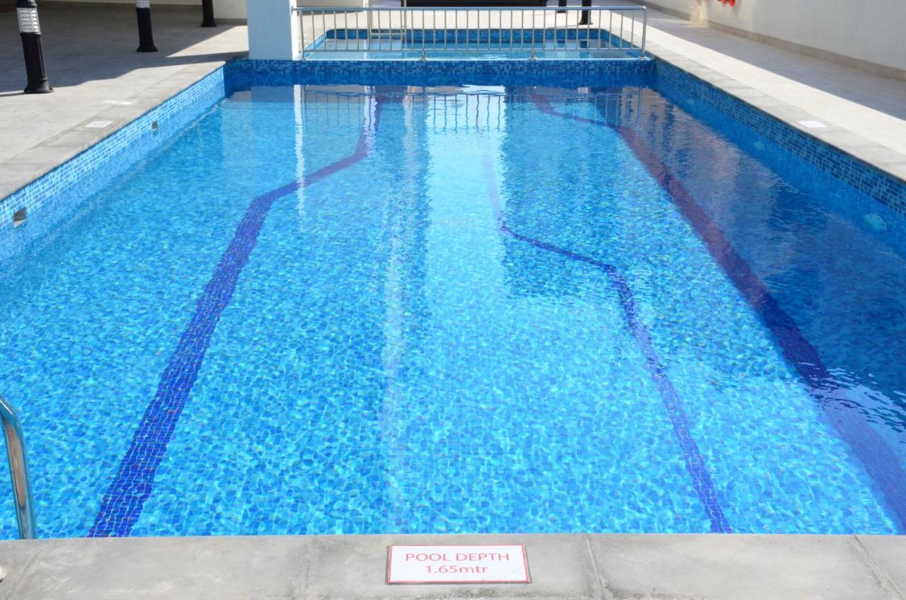 The Lodge Suites Manama Exterior photo